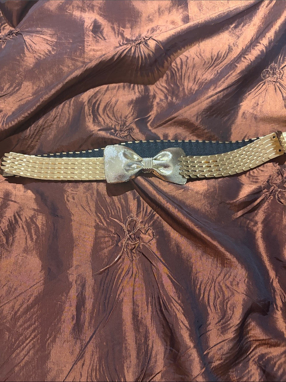 Vintage gold tone stretch belt with bow tie clasp